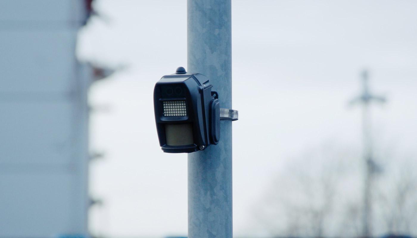 wireless alarms attached to pole